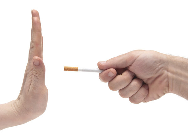 Hand saying no thanks to proposed cigarette