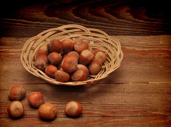 Wood nuts in a basket — Stock Photo, Image