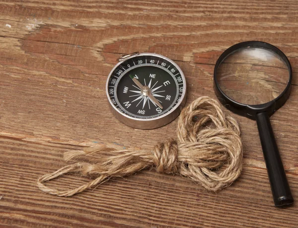 Rope Compass Magnifying Glass Wood Background — Stock Photo, Image