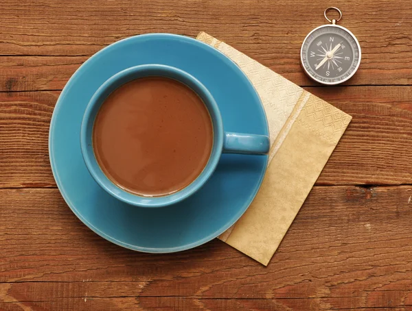 Cup of coffee and compass — Stock Photo, Image
