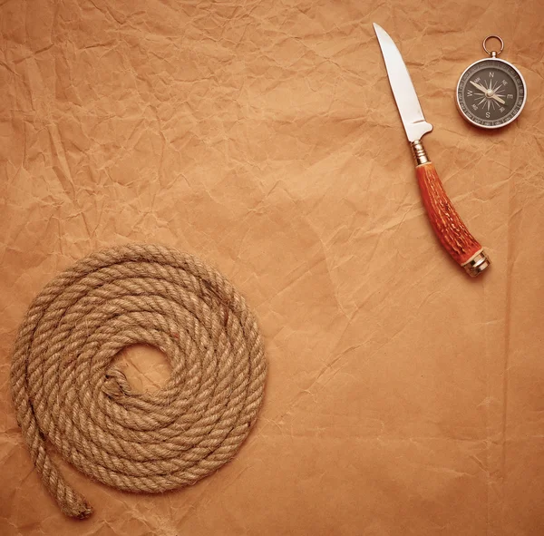 Hunting Knife Rope Compass Old Paper Background — Stock Photo, Image