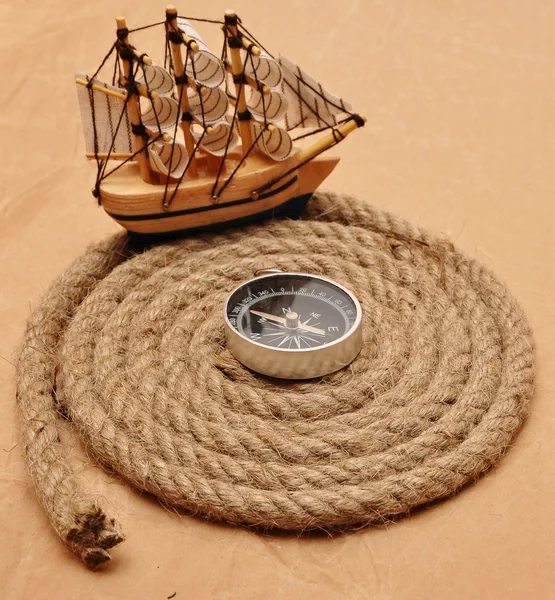 Rope coil with compass in the center — Stock Photo, Image