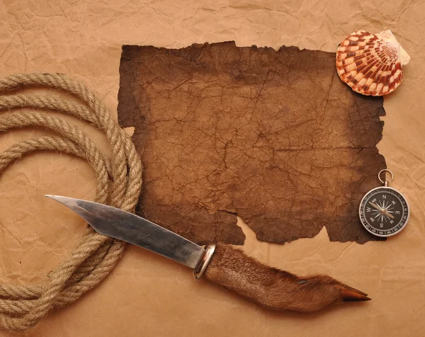 Stock image Adventure decoration with compass on old paper