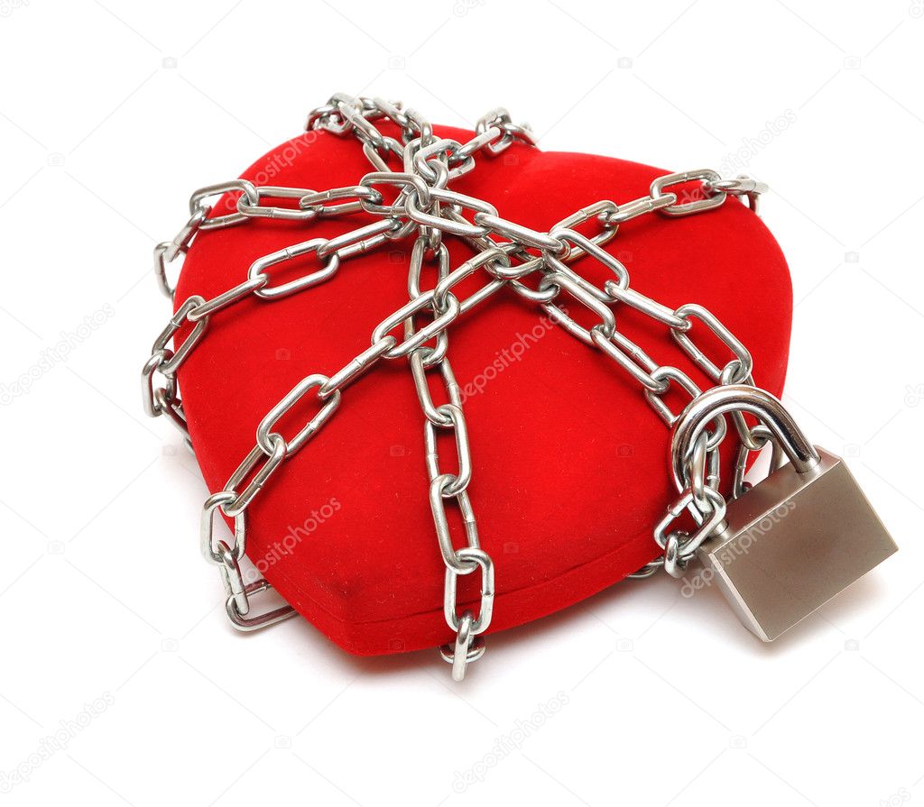 Love locked heart shape with chains on white