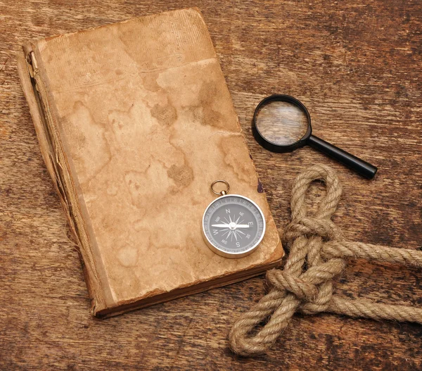 Old Book Compass Magnifying Glass Wood Background — Stock Photo, Image