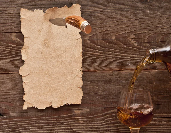 Old Paper Pinned Wooden Wall Knife Glass Splashes Brandy — Stock Photo, Image