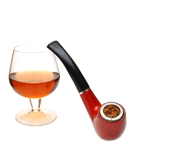 Pipe och cognac glas — Stockfoto
