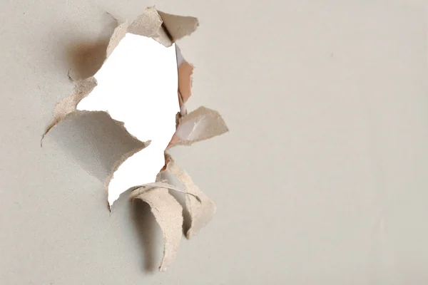 Torn Paper Gray Cardboard Ripped Apart Showing Underlying Layer — Stock Photo, Image