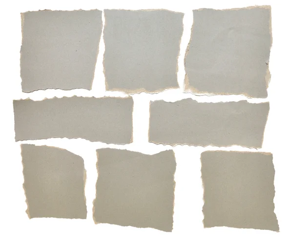Samling av grå slet bitar av papper — Stockfoto