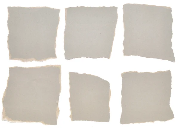 Collection of grey ripped pieces of paper — Stock Photo, Image