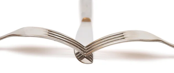 Closeup resumo de uma faca de prata e garfo com espaço para texto — Fotografia de Stock