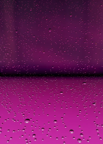 Wassertropfen auf abstrakter roter Oberfläche — Stockfoto