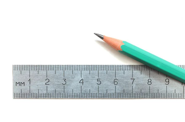 Stål linjal och trä blyertspenna — Stockfoto