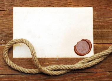 Old paper with a wax seal clipart