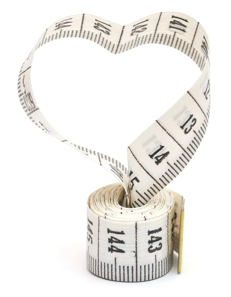 Fita de medição parecendo coração — Fotografia de Stock
