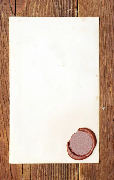 Papel velho com um selo de cera — Fotografia de Stock