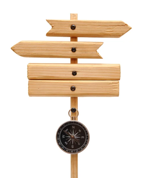 Drewniane strzałki znak drogowy z kompasem — Zdjęcie stockowe