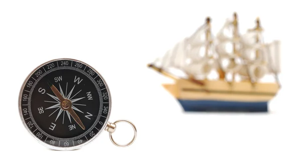 Compass and model classic boat — Stock Photo, Image