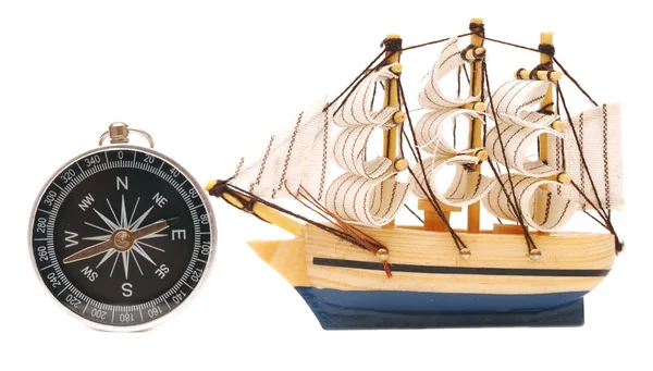 Compass and model classic boat — Stock Photo, Image