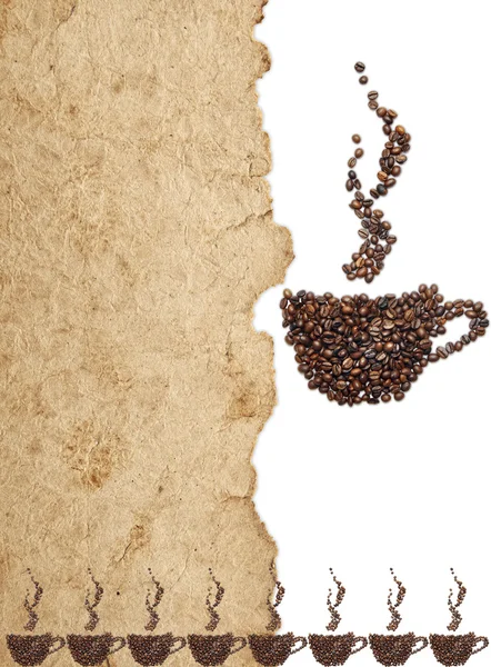 Coffee beans on old parchment paper — Stock Photo, Image