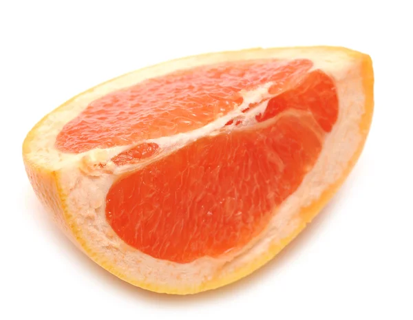Grapefruity plátek na bílém pozadí — Stock fotografie