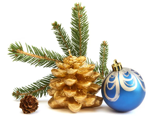 Isolated golden pine cone and blue Christmas ball — Stock Photo, Image