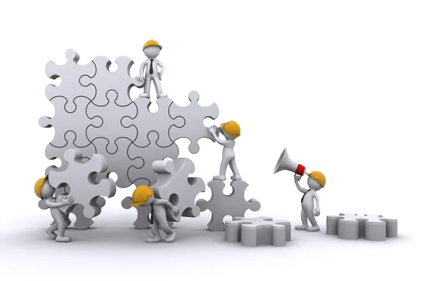 Business team work building a puzzle. Buuilding business concept. — Stock Photo, Image