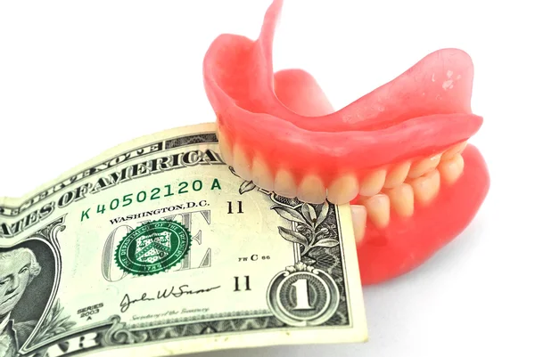 Dentiers et dollar — Photo