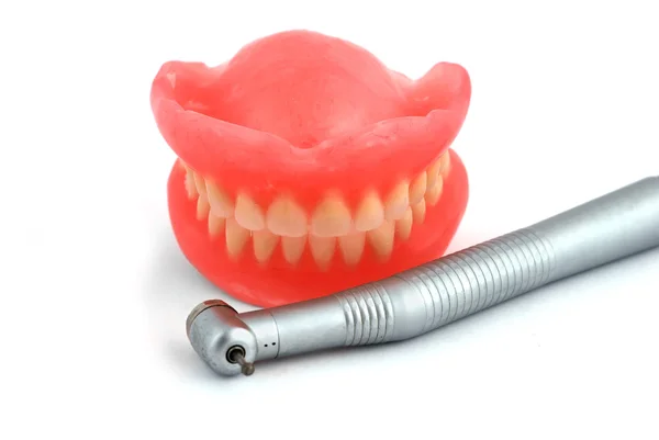Dentiers et pièce à main — Photo
