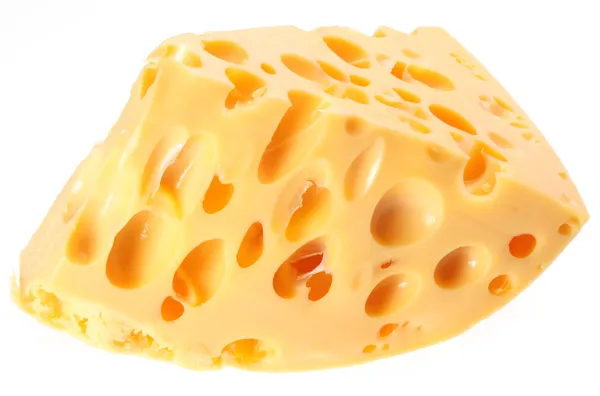 Pedazo de queso suizo sobre un fondo blanco — Foto de Stock