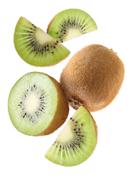 Fallande kiwifrukt och kiwi segment. — Stockfoto