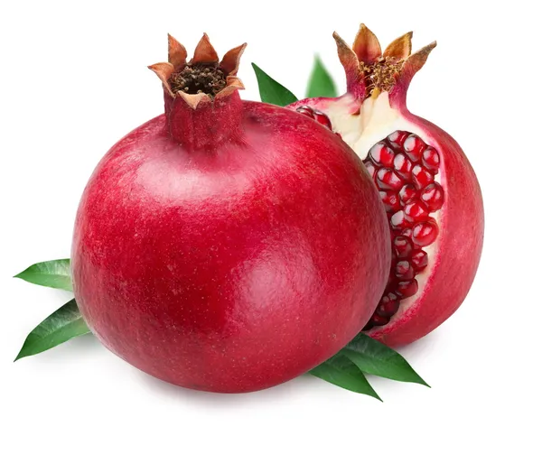 Pomegranate and half of pomegranate on back. — Stock Photo, Image