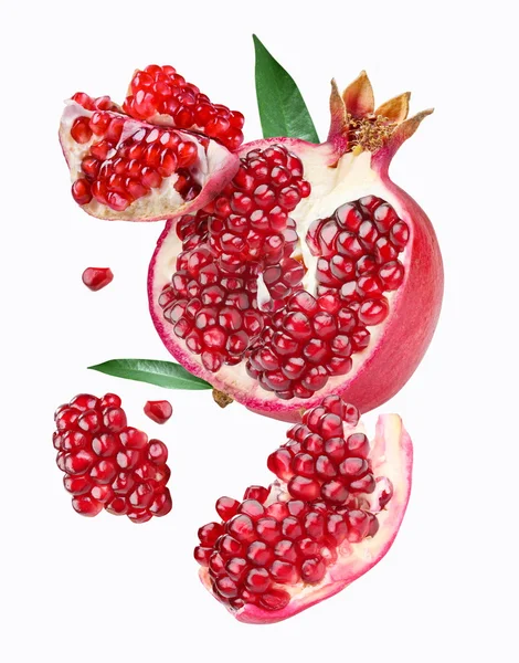 Falling pomegranate slices. — Stock Photo, Image