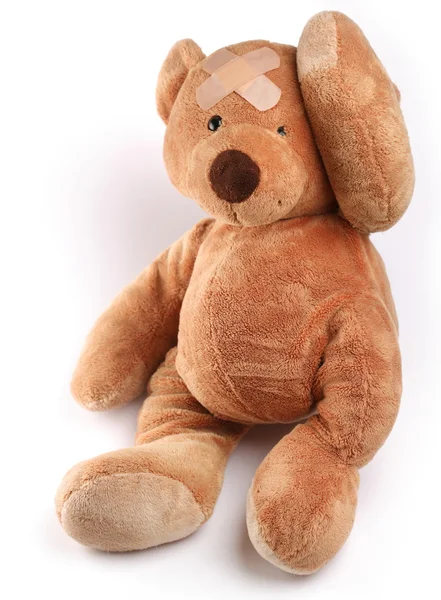 Teddybär in Sorge. isoliert über weiß. — Stockfoto