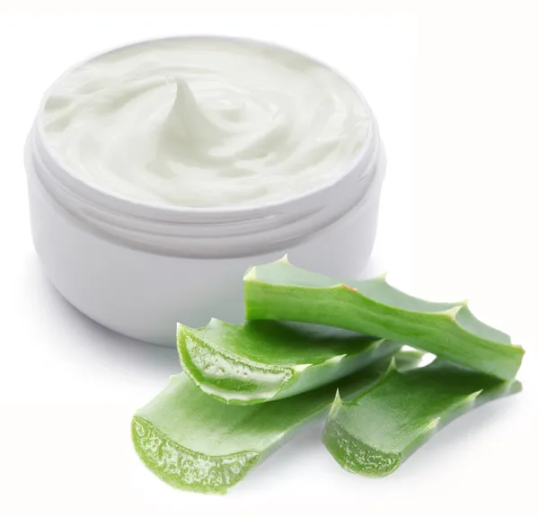 Opened plastic container with cream and aloe. — Stock Photo, Image
