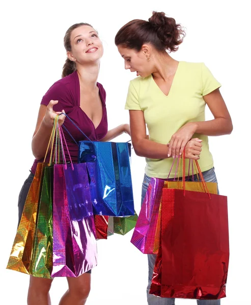 Två vänner med shopping. en flicka underverk inköp andra gir — Stockfoto