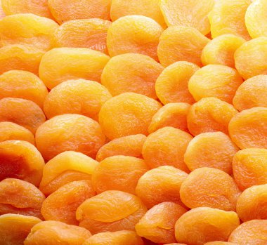 Background of apricots halves. clipart