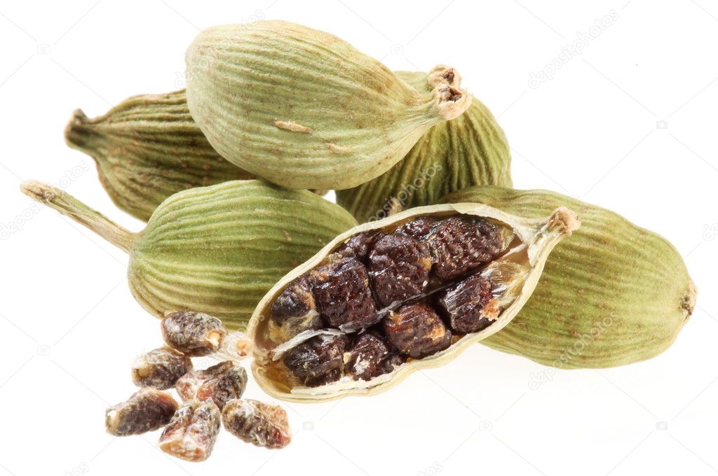 Cardamom seeds on a white background