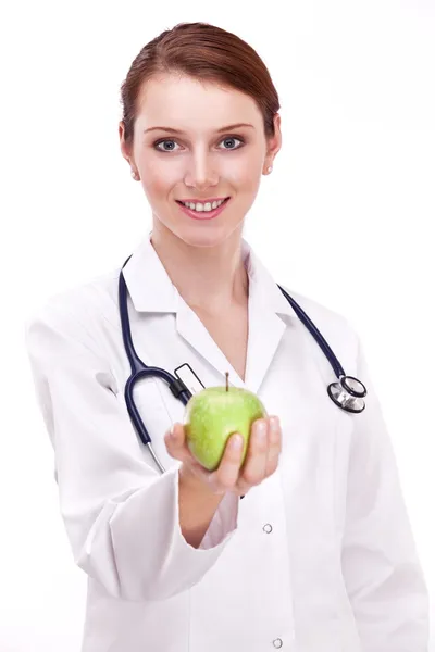 Läkare med ett äpple i handen. isolerad på en vit. — Stockfoto