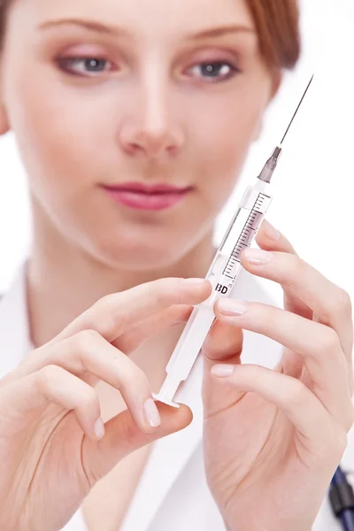 Doctor holds on syringe. Macro shoot of syringe. — Stock Photo, Image
