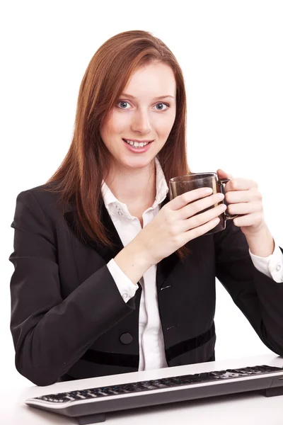 ΝΕΩΝ ΕΠΙΧΕΙΡΗΜΑΤΙΩΝ γυναίκα, κρατώντας ένα φλιτζάνι καφέ. απομονωμένη σε ένα μόριο — Φωτογραφία Αρχείου