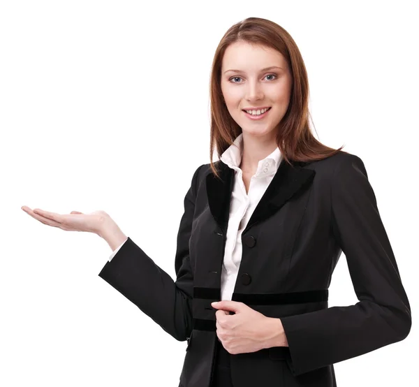 Mujer joven en traje de negocios muestra su palma vacía. Aislado en un —  Fotos de Stock