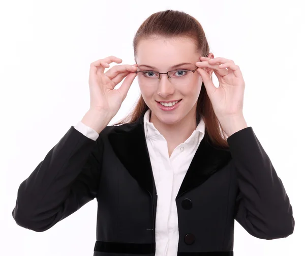 Young business woman puts on specticales. Isolated on a white ba — Stock Photo, Image