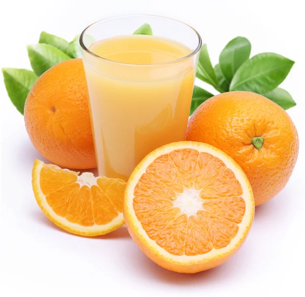 Orangensaft und Früchte. — Stockfoto