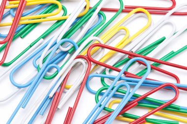 Group of colored paper clips. clipart