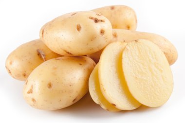 Yellow potatoes with segments on a white background clipart