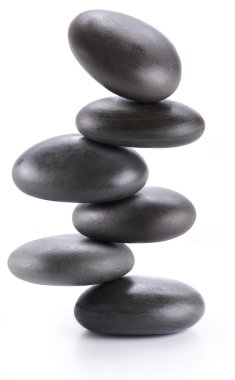 Creative image - pyramid of balancing spa stones on a white back clipart