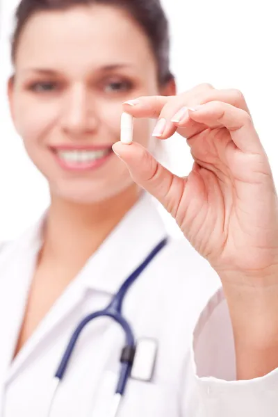 Läkare föreslår ett piller. — Stockfoto