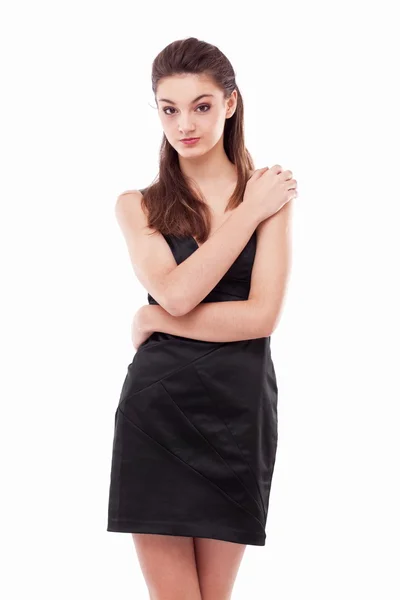 Jong meisje gekleed in zwart op een witte achtergrond — Stockfoto