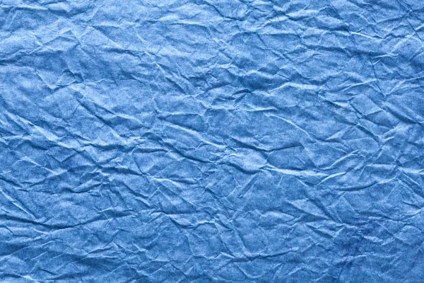 Изображение текстуры смятой голубой бумаги . — стоковое фото